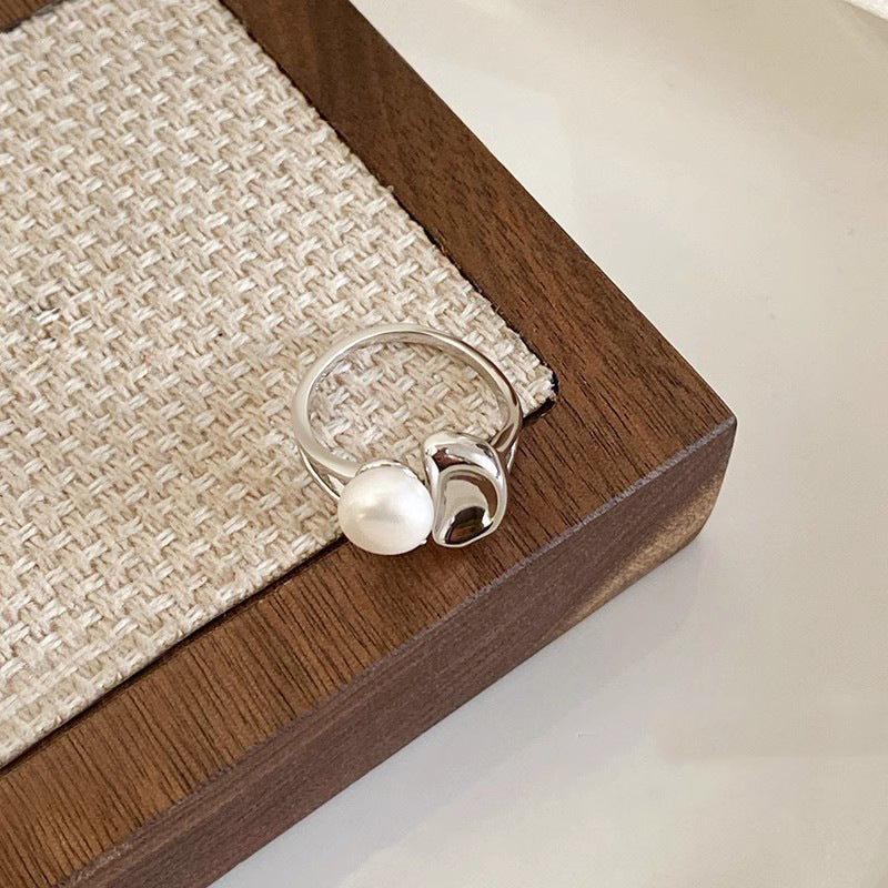 Damen eleganter Ring mit Perlen- und geschwungenem Akzent Shop Nory