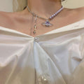 Damen Halskette mit verspieltem Anhänger und eleganten Perlendetails Shop Nory