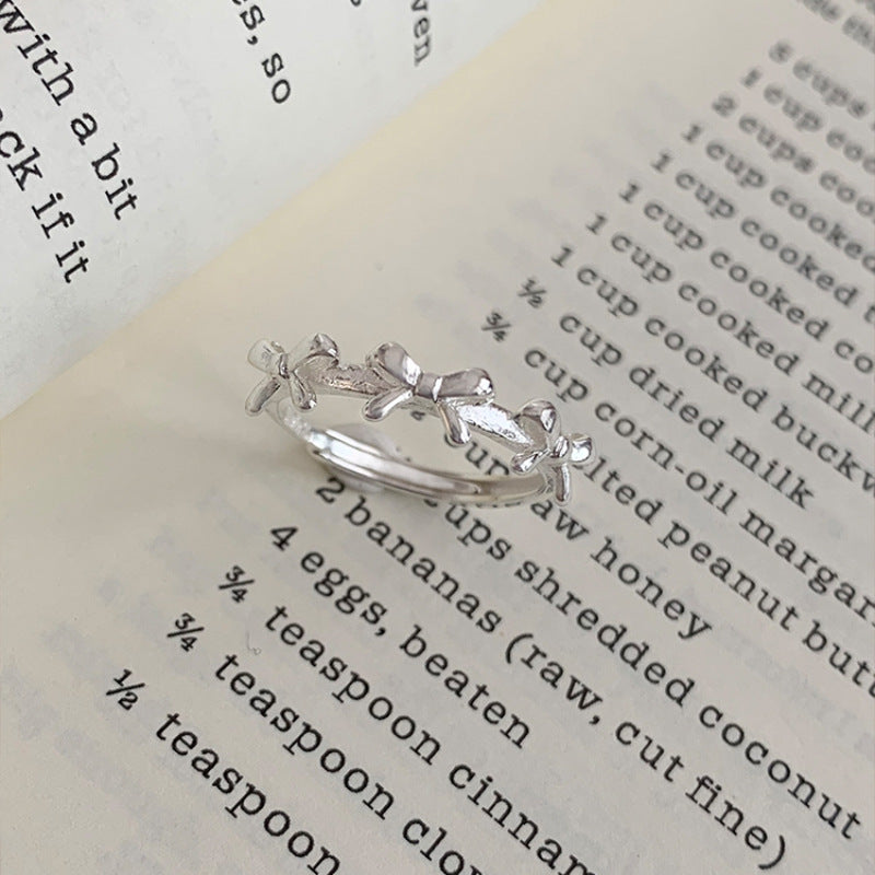 Damen Zierlicher und filigraner Ring mit Schleifenmotiv Shop Nory