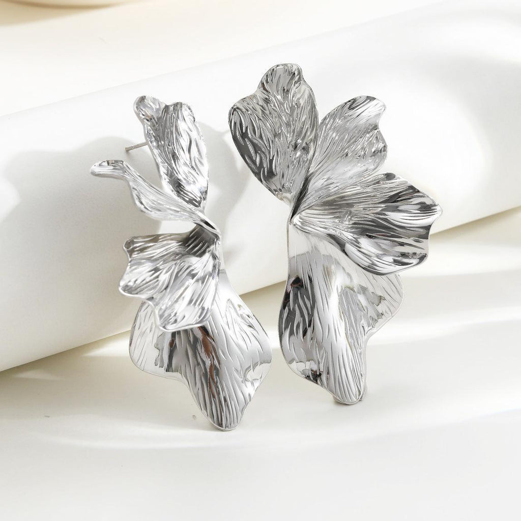 Damenohrringe mit floralen Motiven und glänzender Oberfläche Shop Nory