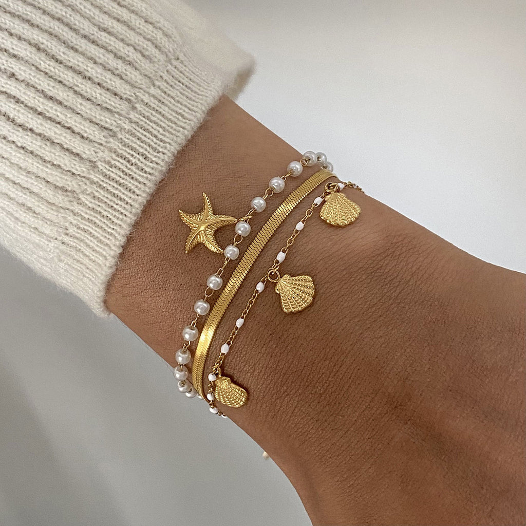 Damen Armband mit Muschel- und Sternenmotiven aus hypoallergenem Edelstahl Shop Nory