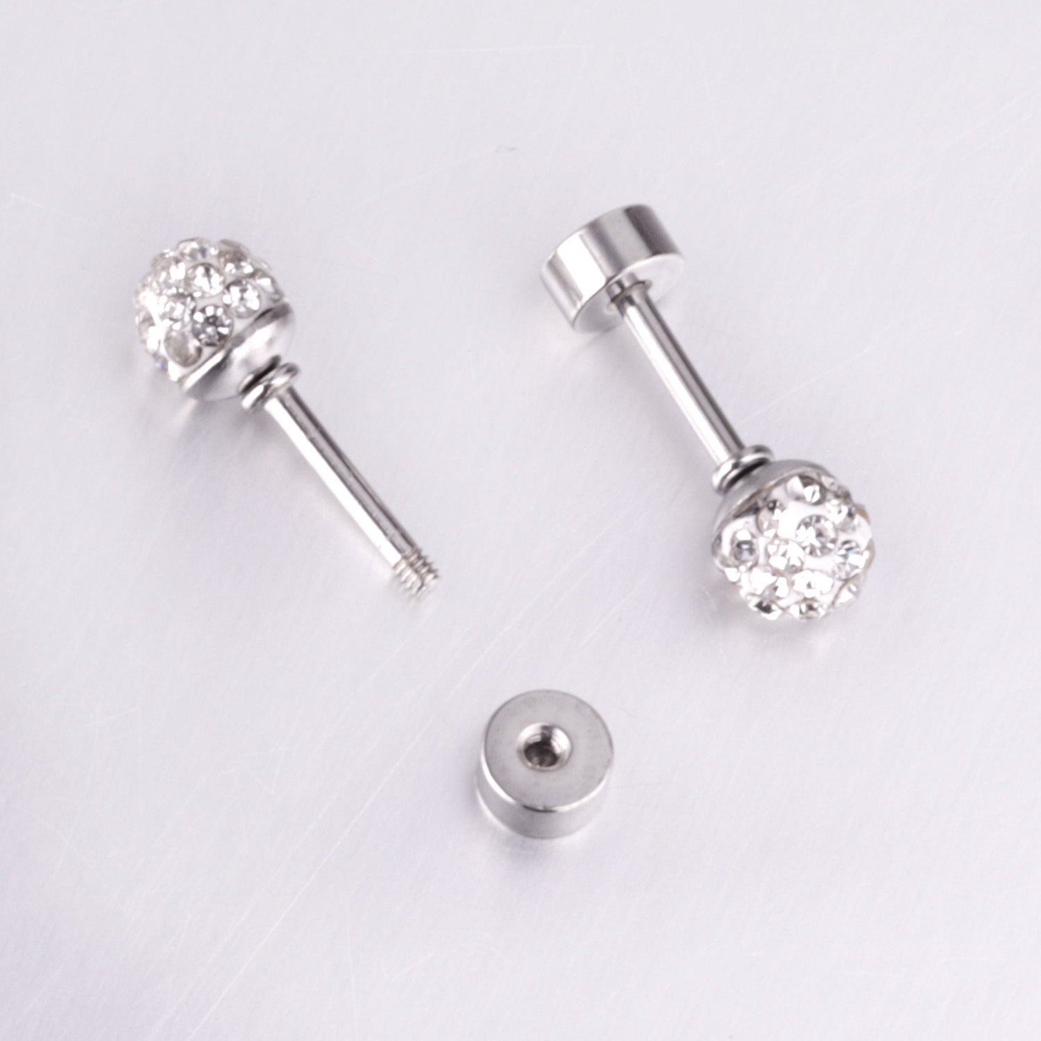 Damen Ohrstecker aus Edelstahl mit funkelnden Zirkonia Shop Nory