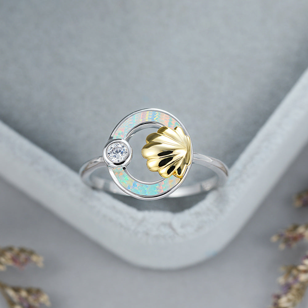 Damen Ring mit stilvollem Muschel-Design und schimmerndem Opal Shop Nory