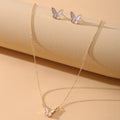 Damen Schmuckset mit verspielten Schmetterlingsanhängern und Ohrsteckern Shop Nory