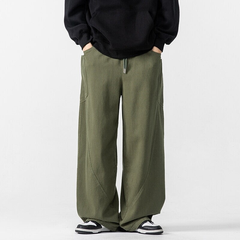 Herren Weite Loungehose mit Tunnelzug, aufgesetzten Taschen und markanten Panelnähten Shop Nory