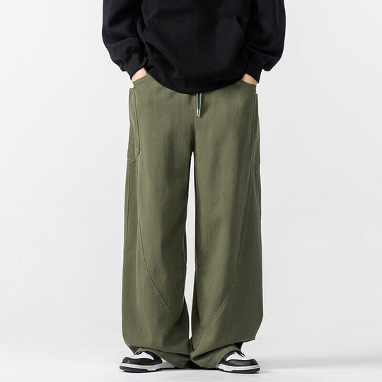 Herren Weite Loungehose mit Tunnelzug, aufgesetzten Taschen und markanten Panelnähten Shop Nory