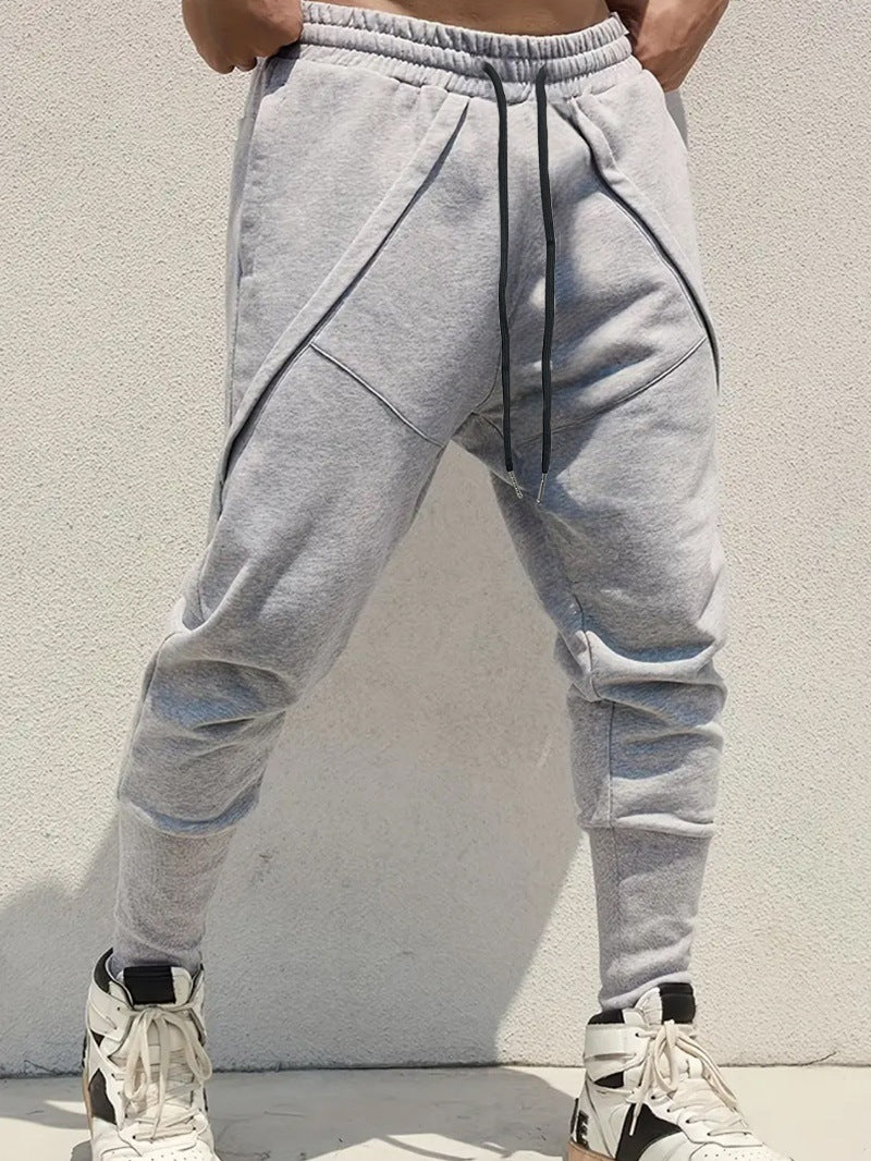 Herren Tapered-Jogginghose mit tiefem Schritt, elastischem Bund & diagonalgesetzten Taschen Shop Nory