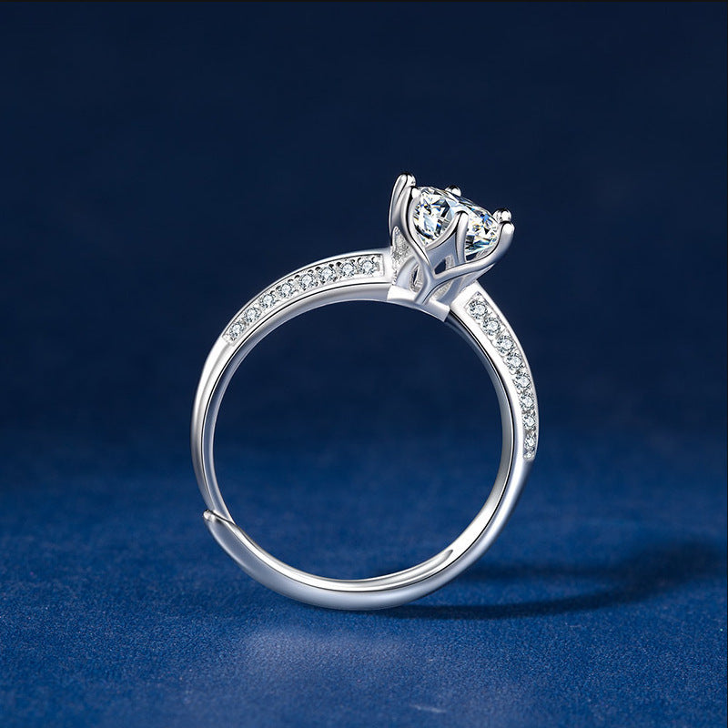 Damen Verlobungsring mit funkelndem Hauptstein und eleganten Zirkonia-Akzenten Shop Nory