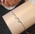 Damen Armband mit filigranem Herzdesign und funkelnden Zirkonia Shop Nory