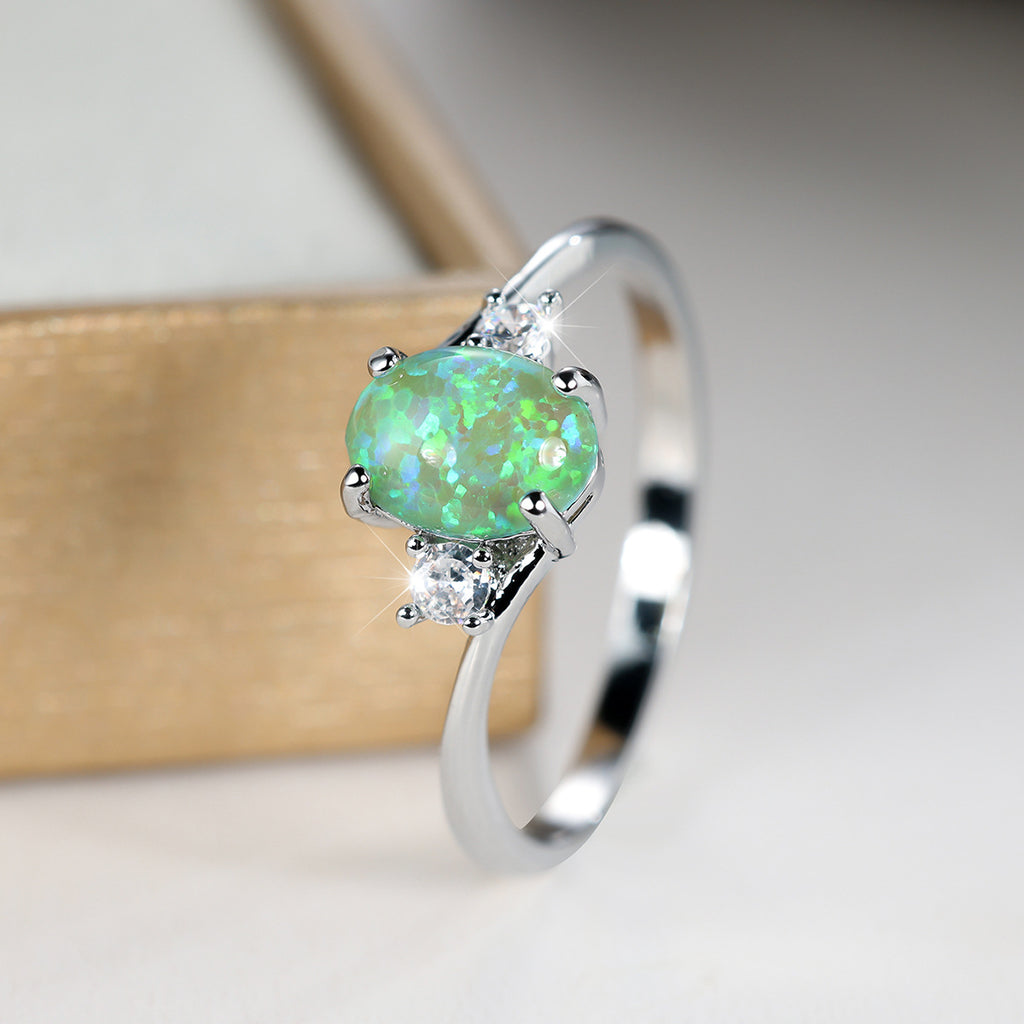 Damen Ring mit Opalstein und funkelnden Zirkonia Shop Nory