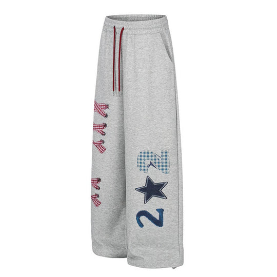 Damen Weite Palazzo-Sweathose mit Karomuster-Applikationen, Tunnelzugbund und verstellbarem Saum Shop Nory