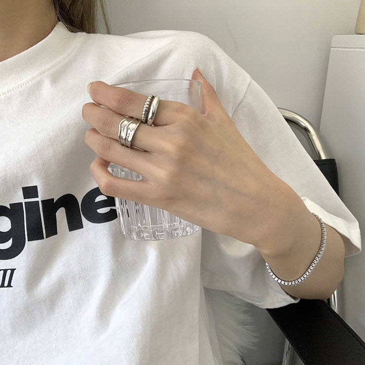 Damenring mit elegantem, mehrschichtigem Design und feinen Details Shop Nory