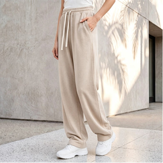 Damen nan weite Loungepalazzo-Hose mit hohem Komfortbund, Kordelzug, seitlichen Eingrifftaschen und dekorativer Seitennaht Shop Nory