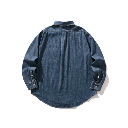 Unisex Oversize-Denim-Hemdjacke mit Knopfkragen, aufgesetzter Brusttasche und abgerundetem Saum Shop Nory