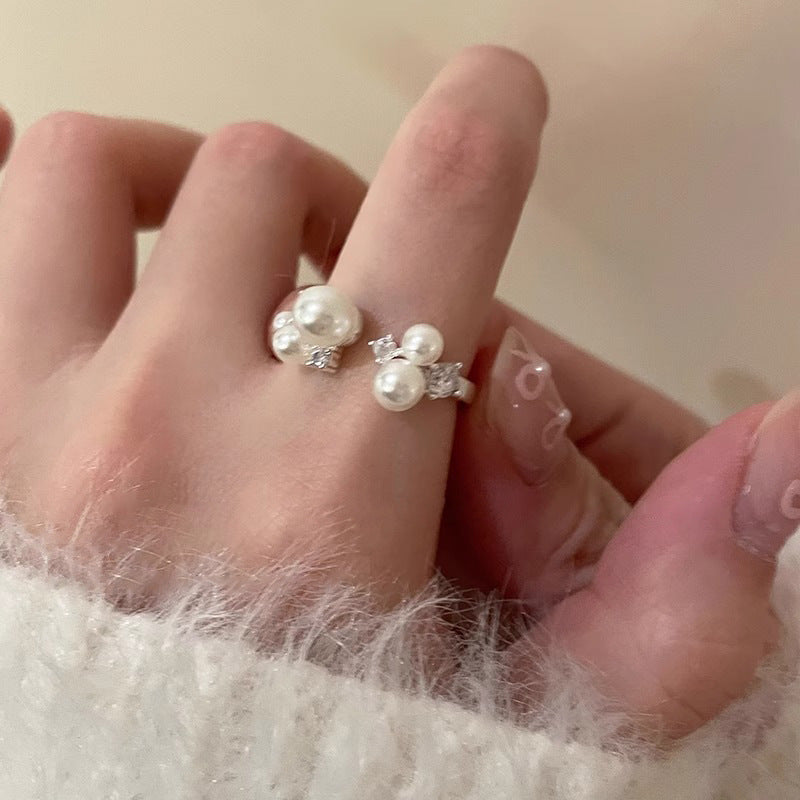 Damenring mit eleganten Perlen und funkelnden Zirkonia-Details Shop Nory
