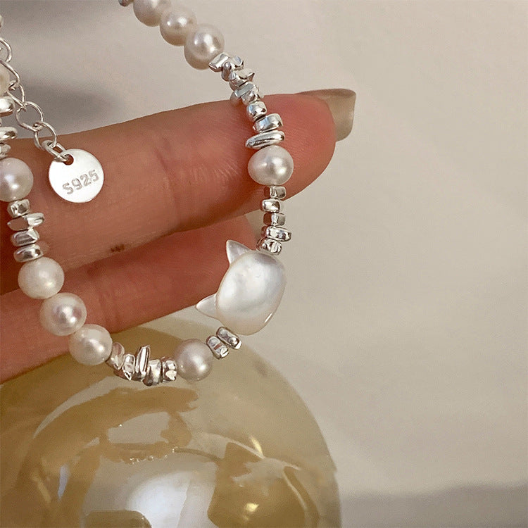 Damen Armband mit handgefertigtem Katzenanhänger und edlen Perlen Shop Nory