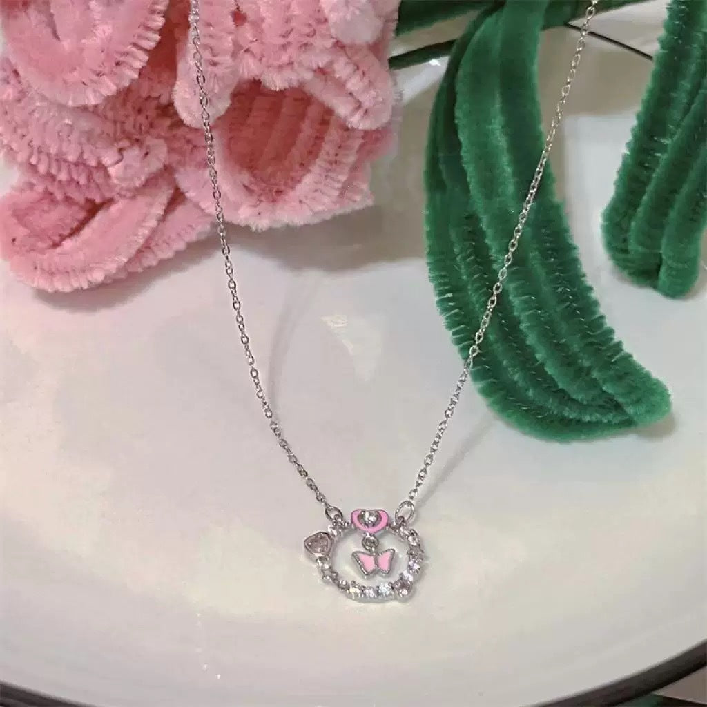 Damen Halskette mit filigranem Herz- und Schmetterlingsdesign Shop Nory