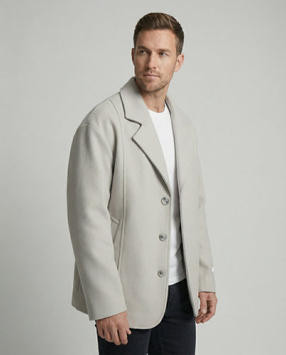 Herren kurzer Wollmix-Sakko mit kastiger Silhouette, tiefem Revers und verdeckten Eingrifftaschen