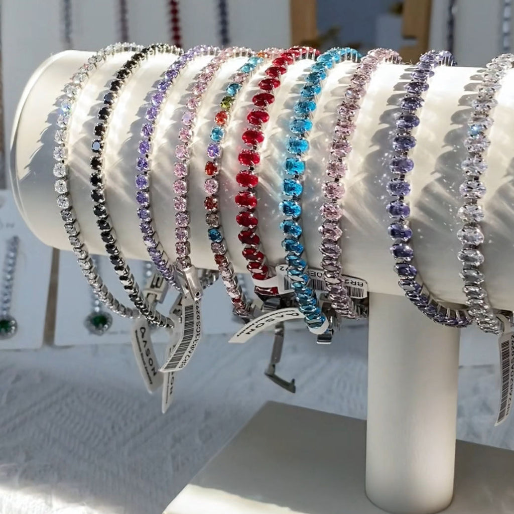Damen Armband mit funkelnden Zirkonia und eleganter Goldbeschichtung Shop Nory