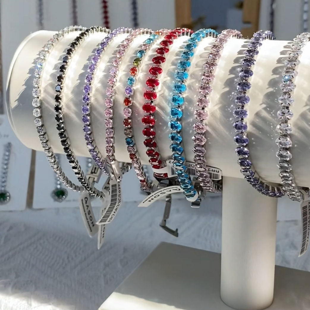 Damen Armband mit funkelnden Zirkonia und eleganter Goldbeschichtung Shop Nory