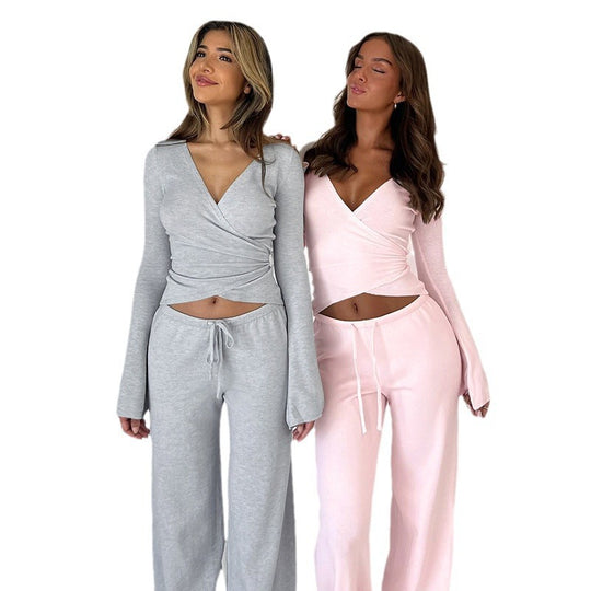 Damen nan Wickel-Cropped-Top mit tiefem V‑Ausschnitt, taillierter Wickelform und langen Glockenärmeln Shop Nory