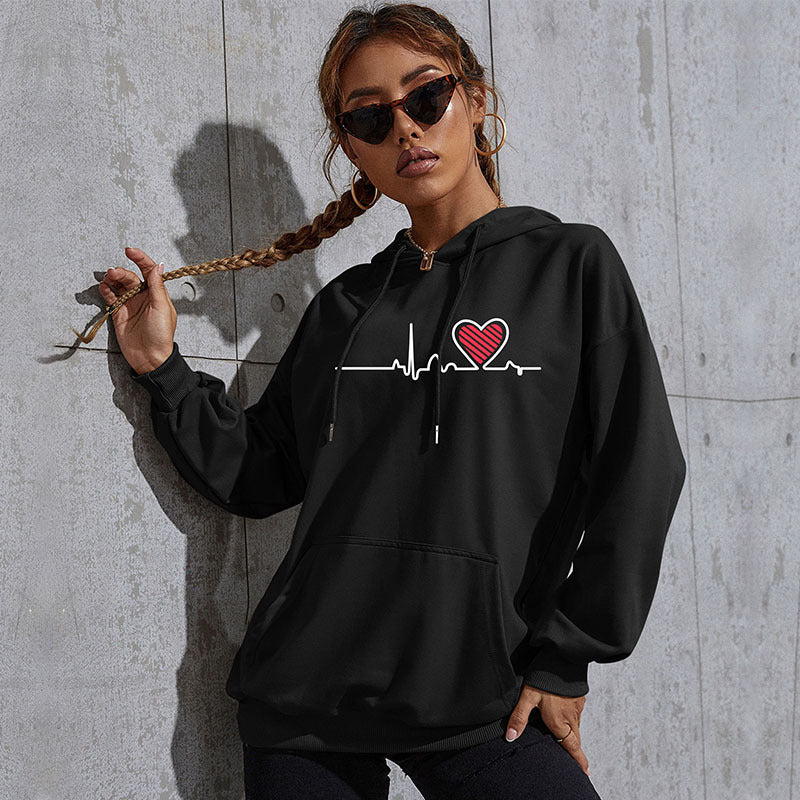 Damen Oversize-Kapuzenpullover mit Herz-EKG‑Print und Kängurutasche Shop Nory
