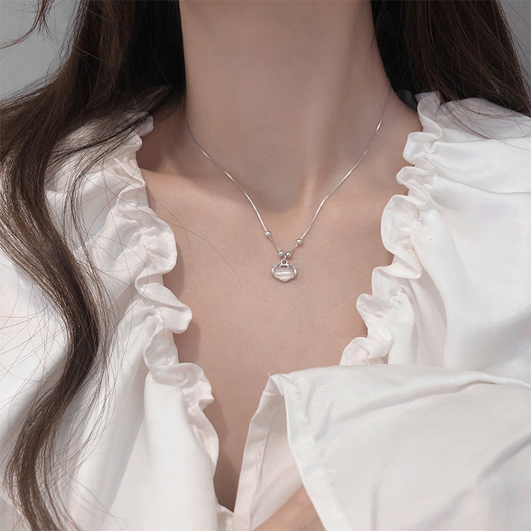 Damen Halskette mit elegantem Herzanhänger und funkelnden Akzenten Shop Nory