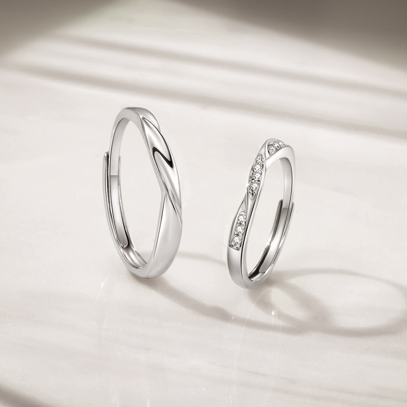 Damen Trauringe mit elegantem geschwungenem Design und funkelnden Akzenten Shop Nory