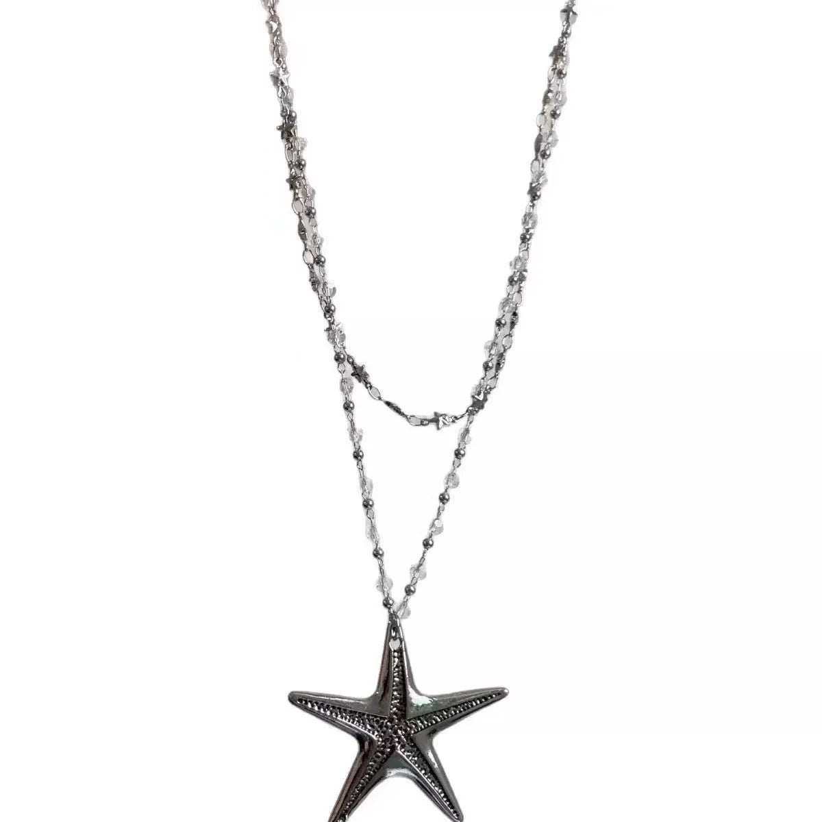 Damen Kette mit schimmerndem Seesternanhänger und exquisiten Perlendetails Shop Nory