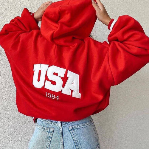 Damen Kurz geschnittener Oversize-Kapuzenpullover mit aufgenähter College-Applikation und gerippten Bündchen Shop Nory