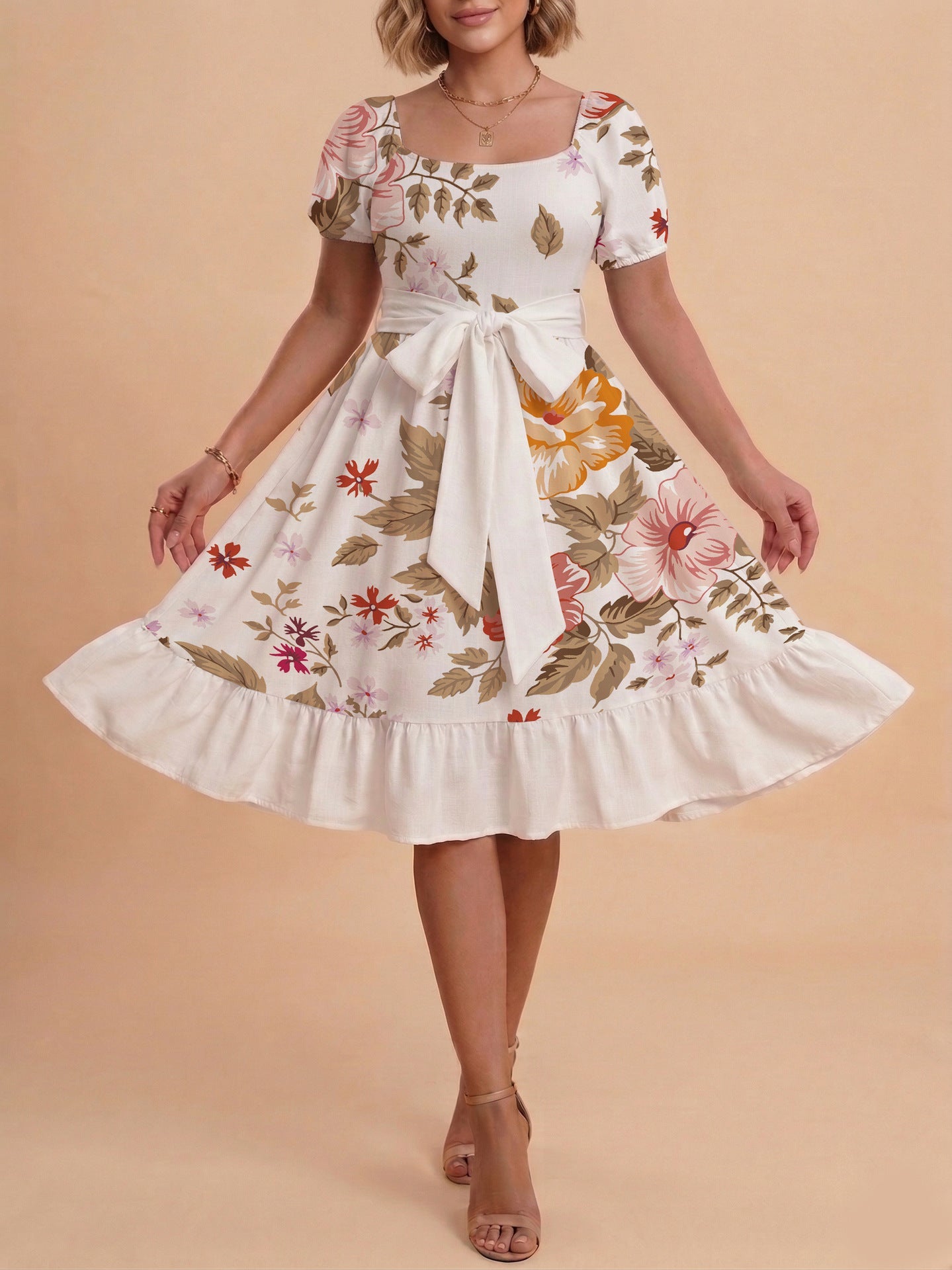 Damen Sommerliches Blumenkleid mit taillierbarem Gürtel und voluminösen Ärmeln