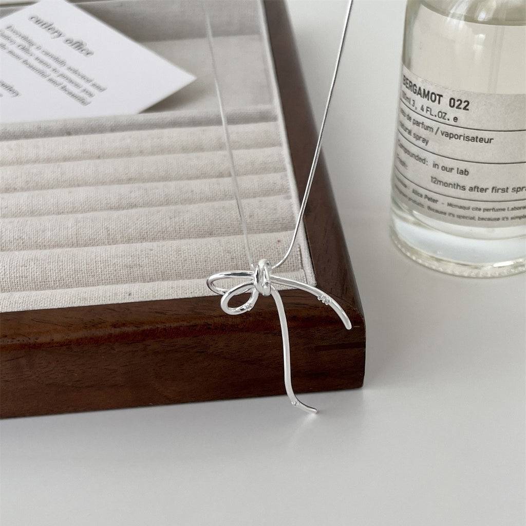 Damen Halskette mit elegantem Schleifenanhänger aus hochwertigem Silber Shop Nory