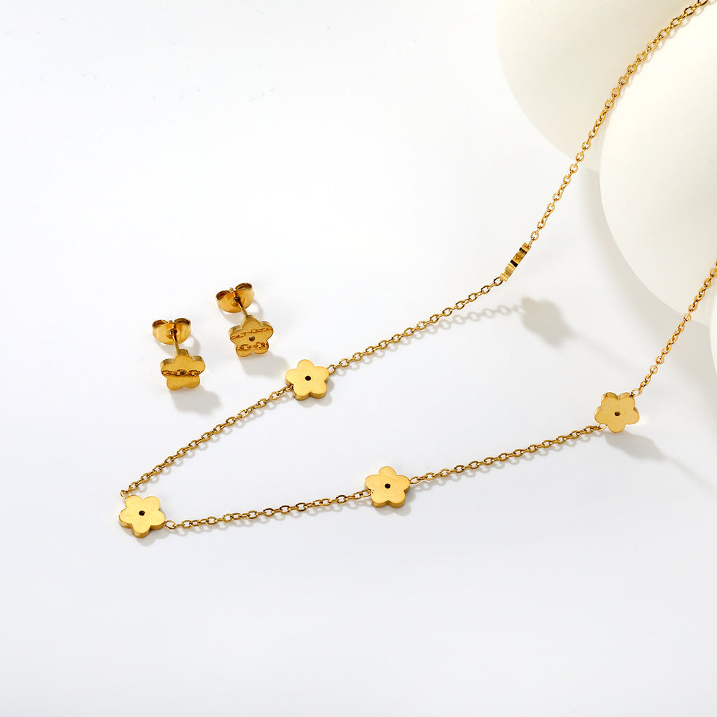 Damen Schmuckset mit filigranen Blumenmotiven und trendigen Anhängern Shop Nory
