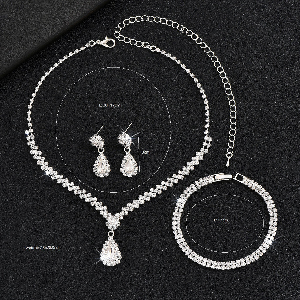 Tropfenpendant und passendes Tropfohrschmuckset für Braut mit kubischem Zirkonia-Halo