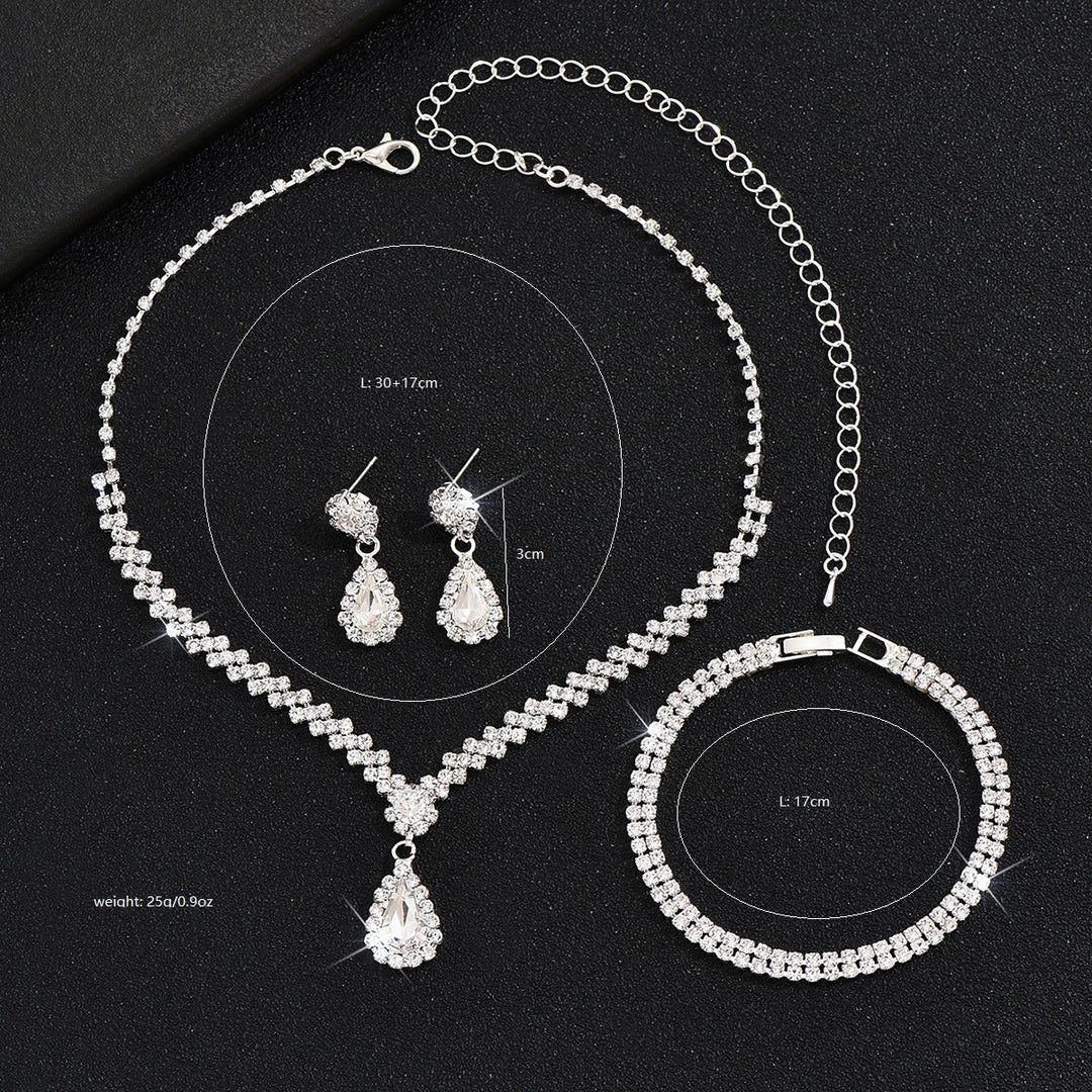 Tropfenpendant und passendes Tropfohrschmuckset für Braut mit kubischem Zirkonia-Halo