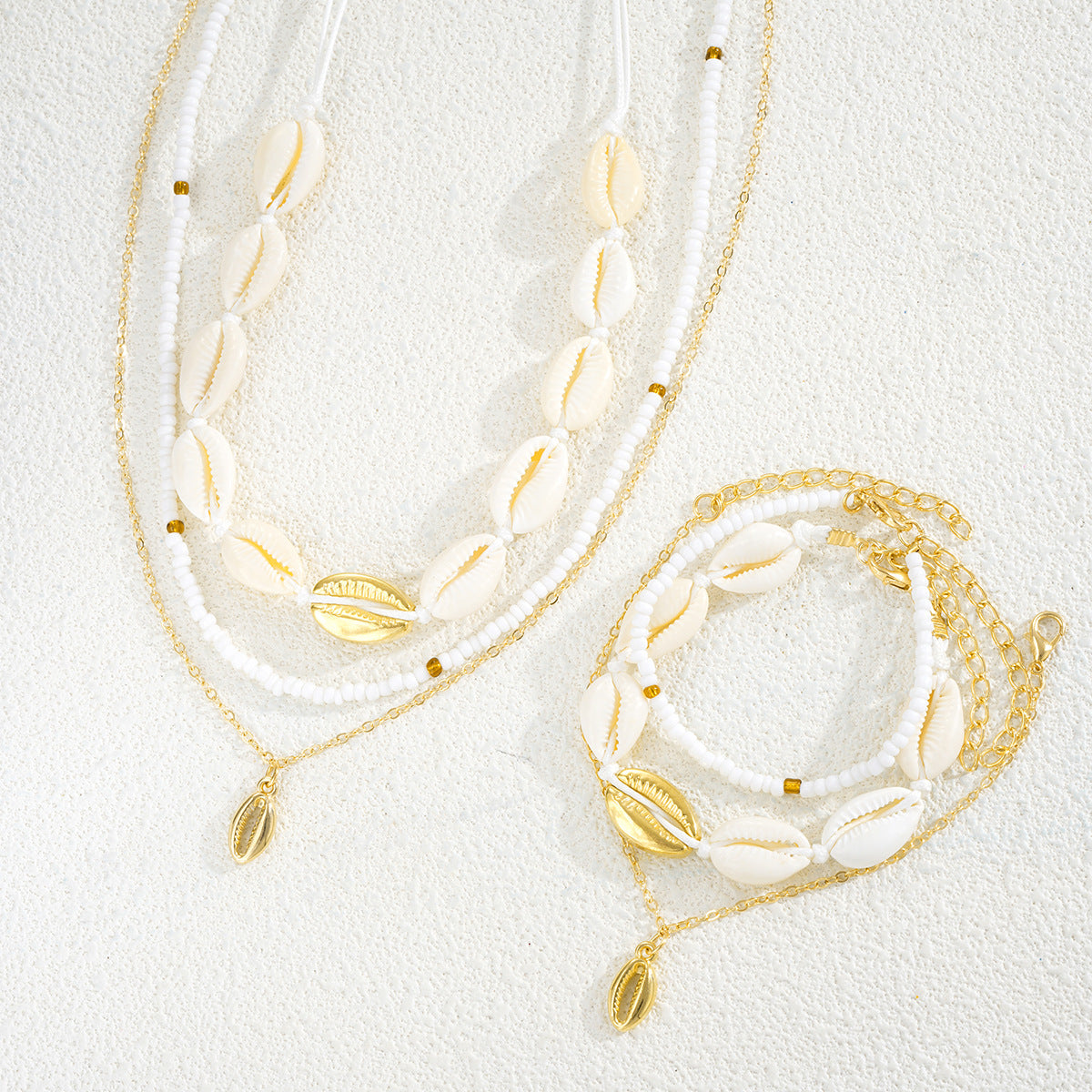 Damen Schmuckset mit maritimen Muschelanhängern und eleganten Ketten Shop Nory