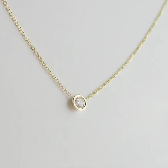Damen Halskette mit funkelndem Zirkonia-Anhänger und feiner Goldkette Shop Nory