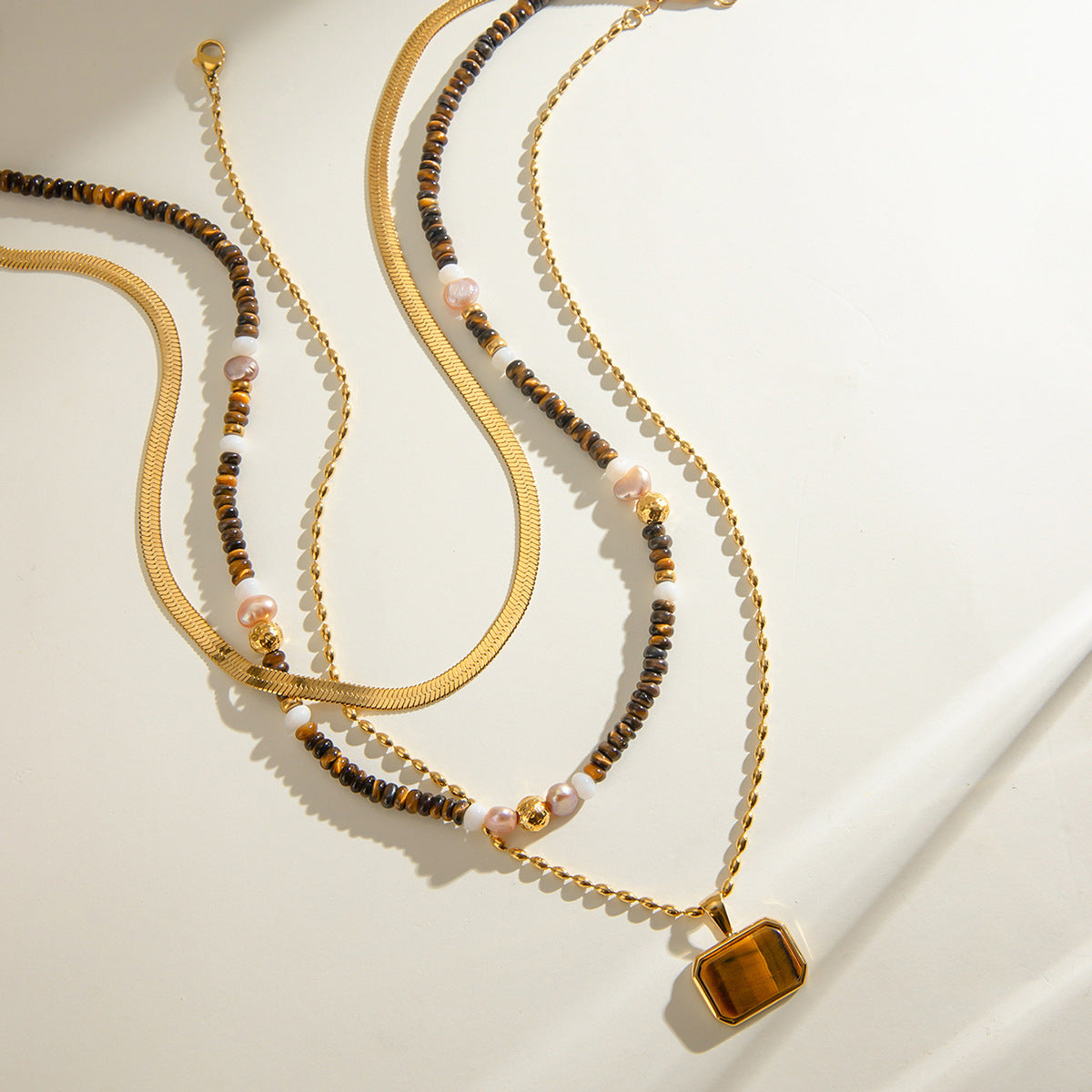 Damen Halskette mit eleganter Tigeraugen-Anhänger aus hypoallergenem Edelstahl Shop Nory