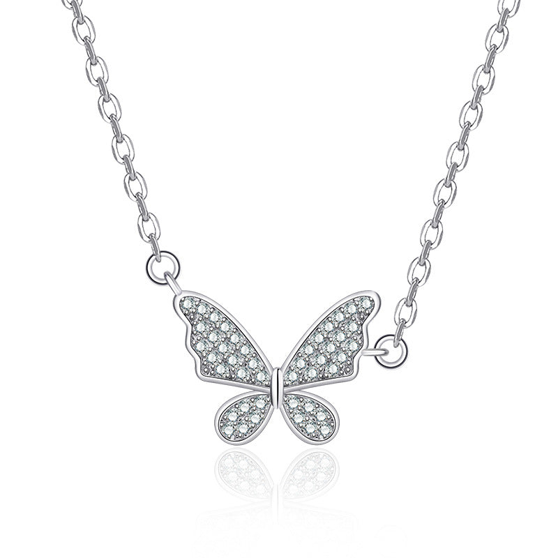 Damen Halskette mit filigranem Schmetterlingsanhänger und funkelnden Zirkonia Shop Nory