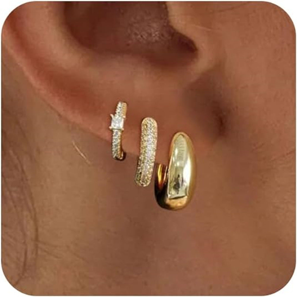 Damen Ohrstecker mit funkelnden Zirkonia und modernem Design Shop Nory