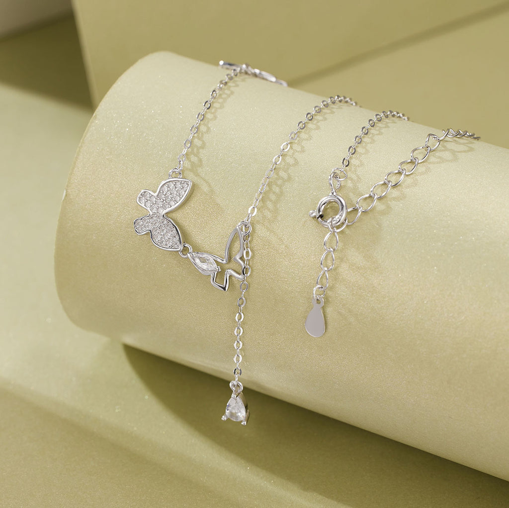 Damen Halskette mit filigranem Schmetterlingsdesign und funkelnden Zirkoniasteinen Shop Nory