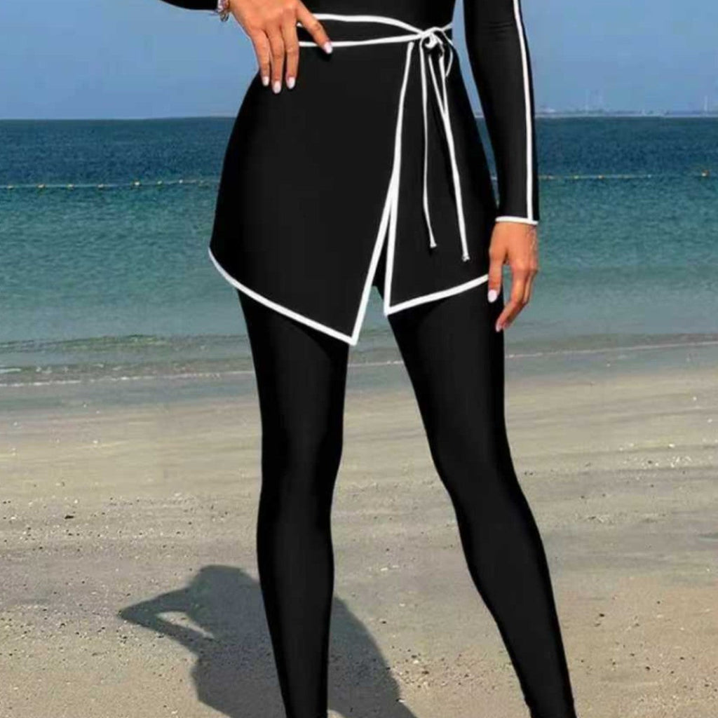 Damen modischer Langarm-Schwimmanzug mit Wickelrock