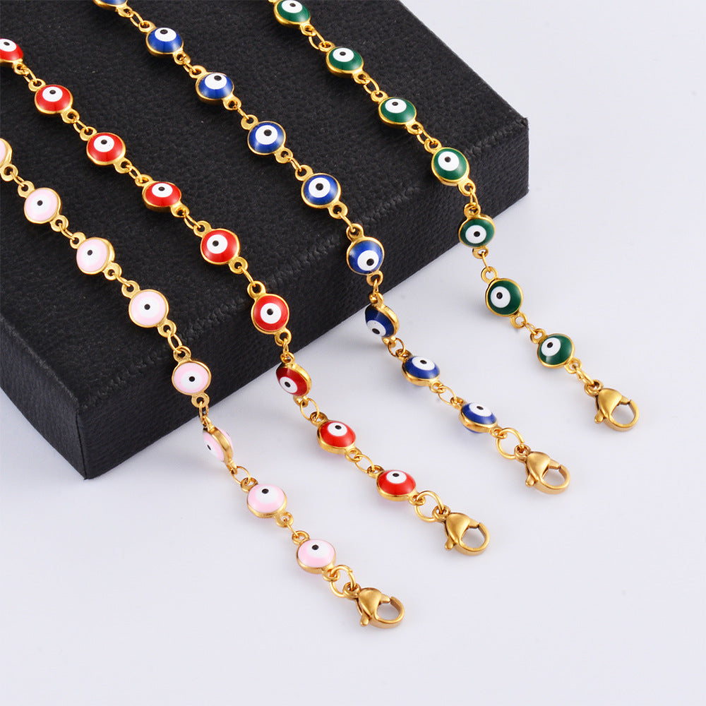 Damen Armband mit schützenden Augenmotiven und feinem Goldglanz Shop Nory