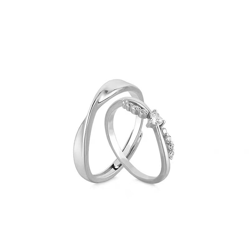 Damenring mit kunstvollem Zirkonia-Besatz und elegantem Wellen-Design Shop Nory