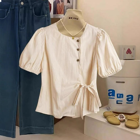Damen Kurzärmlige taillierte Bluse mit Puffärmeln und seitlicher Schleife Shop Nory