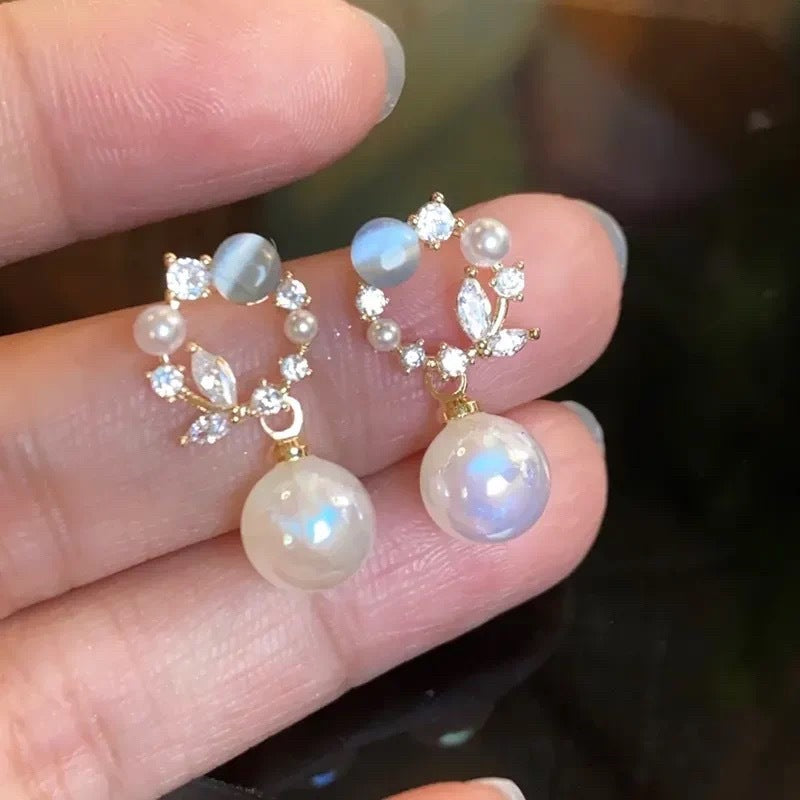 Damen Ohrstecker mit luxuriösem Perlenanhänger und funkelnden Zirkonia Shop Nory