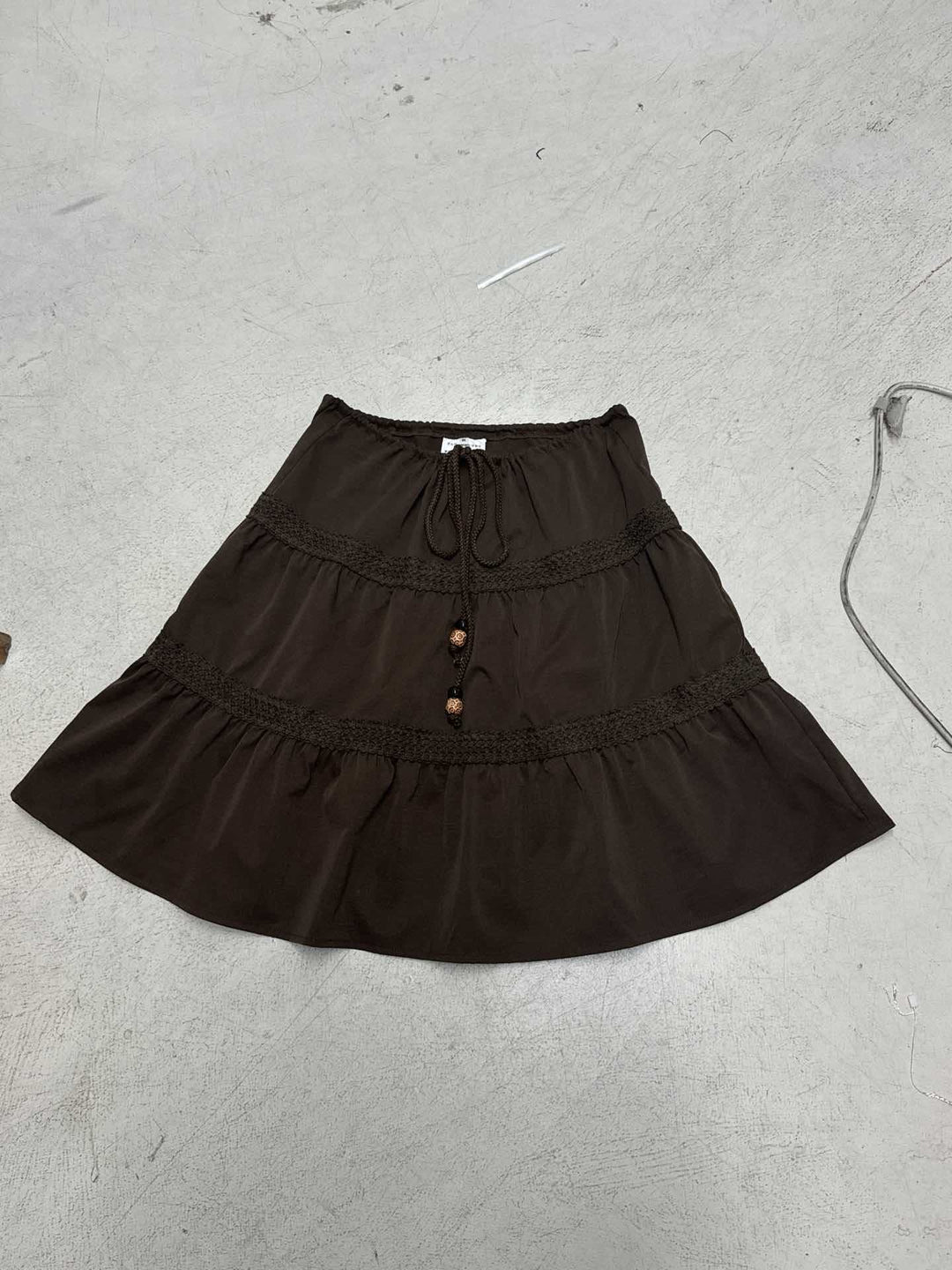 Damen nan gestufter Boho-Midirock mit elastischem Kordelbund und Häkelband-Details Shop Nory