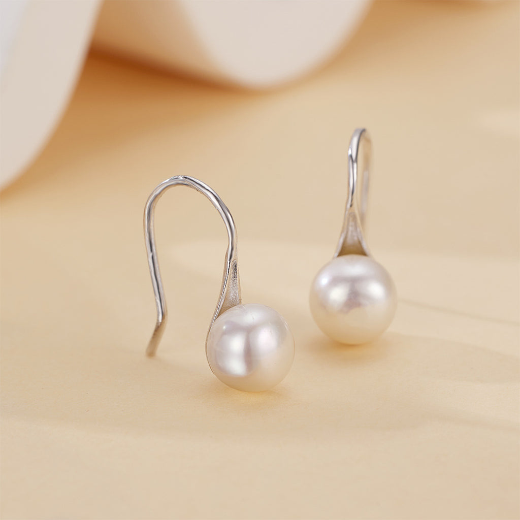 Damen elegante Ohrringe mit geschwungenem Design und echten Süßwasserperlen Shop Nory