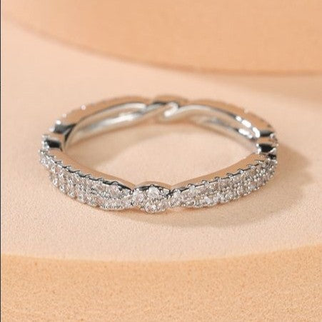 Damen Ring mit funkelnden Zirkonia und exquisitem Wellenmuster Shop Nory