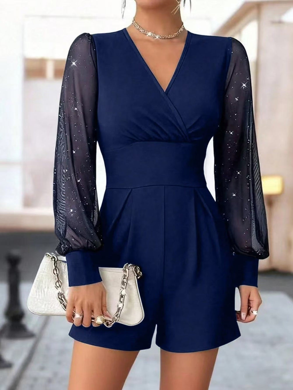 Damen eleganter Jumpsuit mit transparenten Puffärmeln und V-Ausschnitt